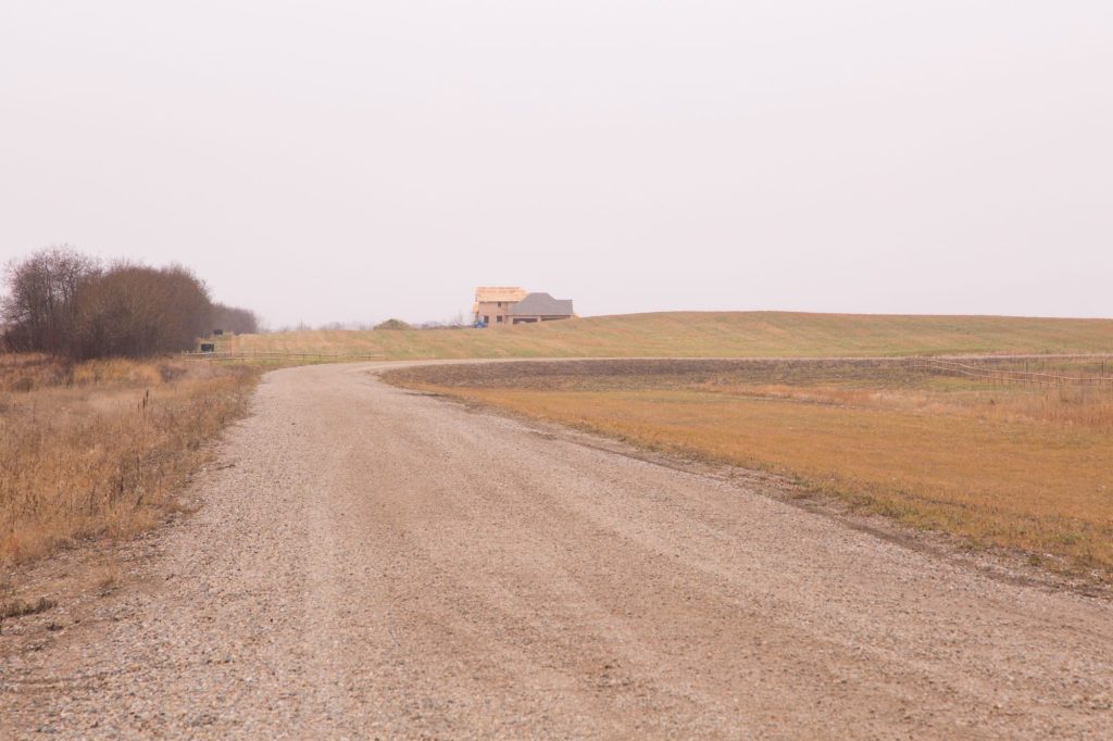 Gravel road leading to a Brylee Estates lot