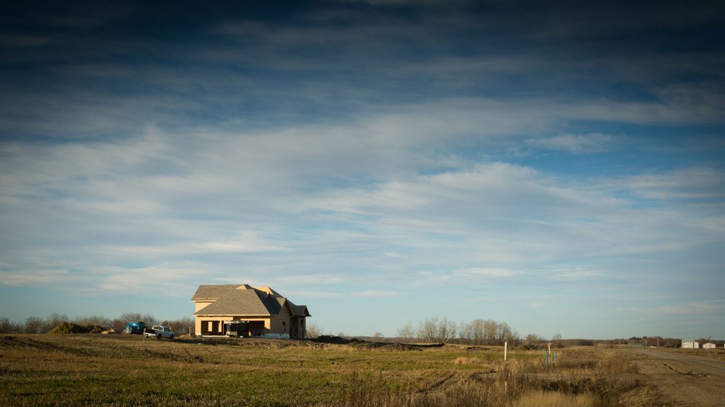New home on a Brylee Estates lot beneath a wide sky